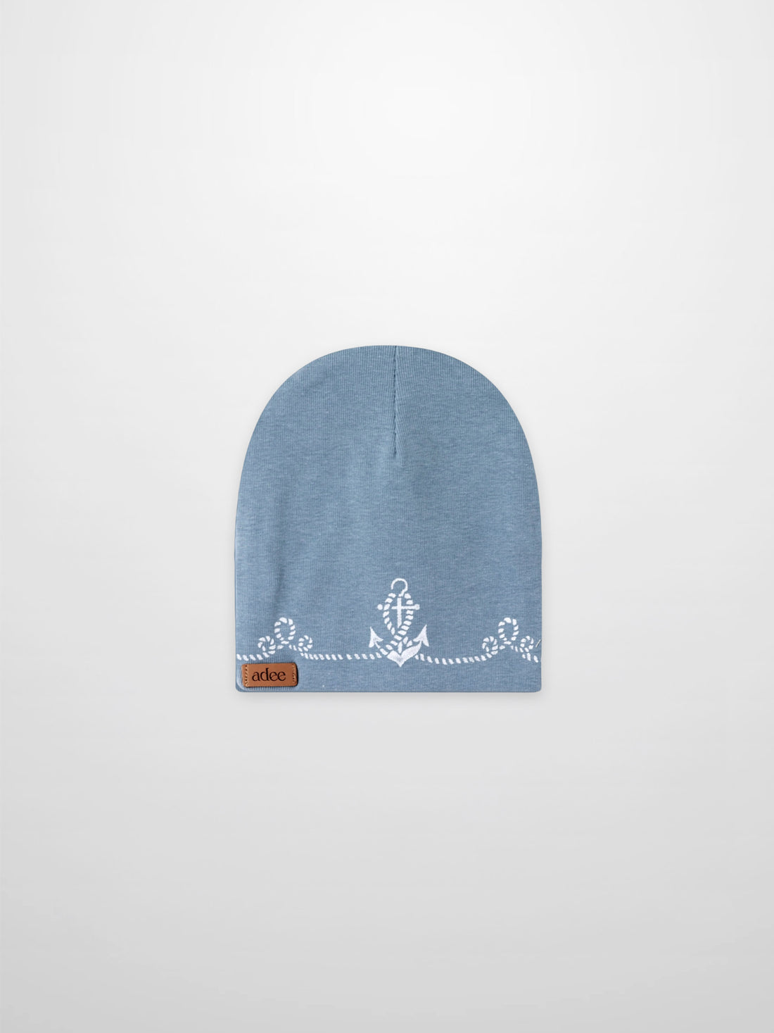 Blue Anchor Beanie for boys by Adee, a light blue knit hat with a white anchor motif and leather patch.