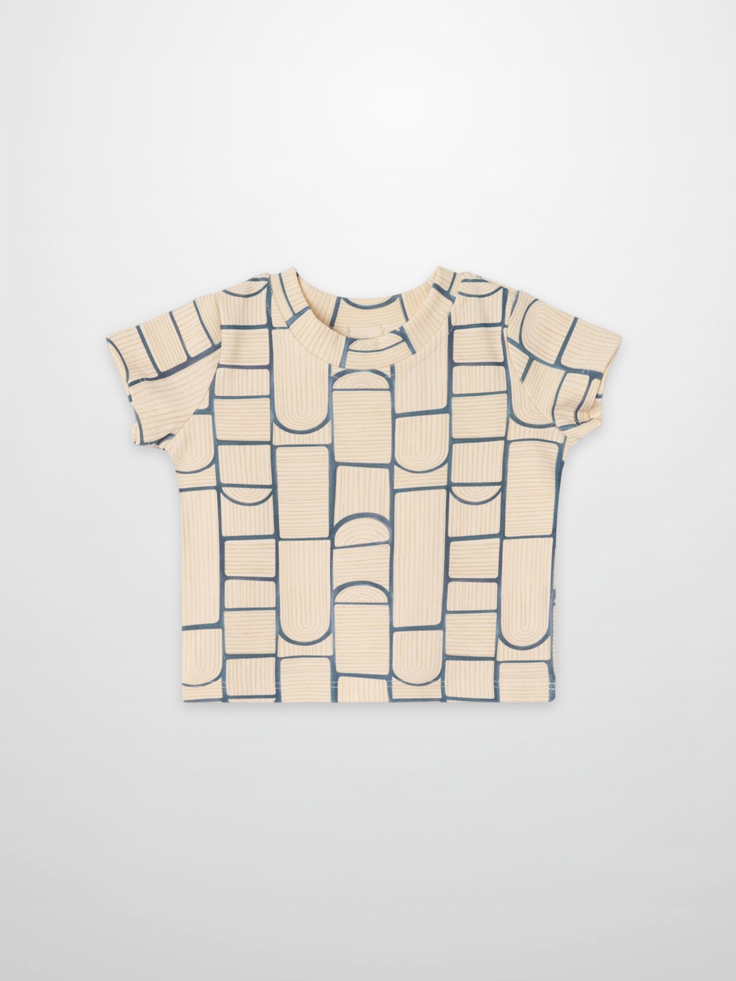 Abstract T-shirt for boys, short-sleeve, with a light beige base and navy blue geometric block pattern across the front.