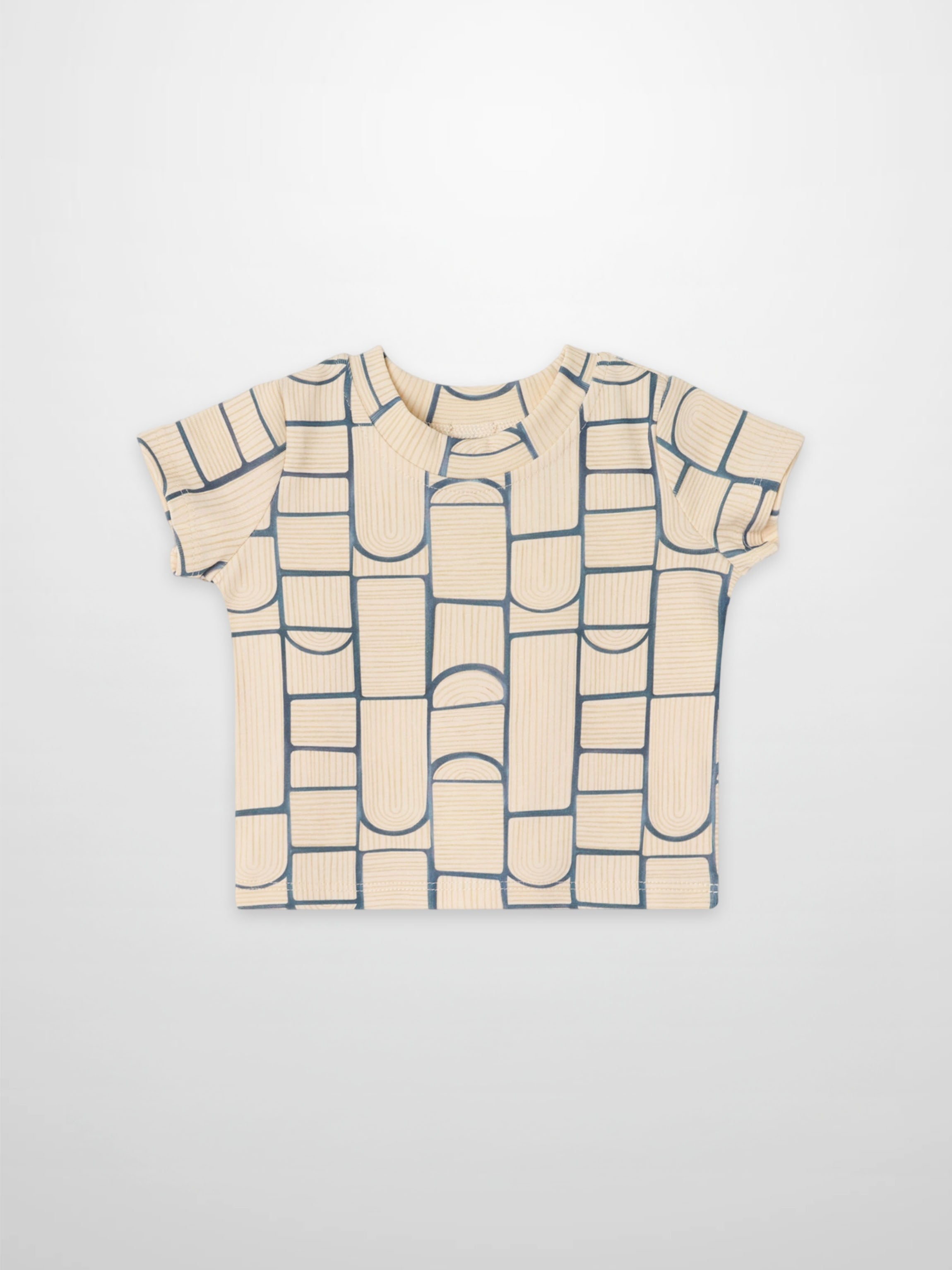 Abstract T-shirt for boys, short-sleeve, with a light beige base and navy blue geometric block pattern across the front.