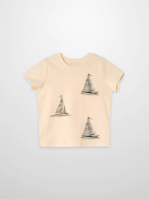 Sail Boat T-Shirt, peach color with three sailboat prints.