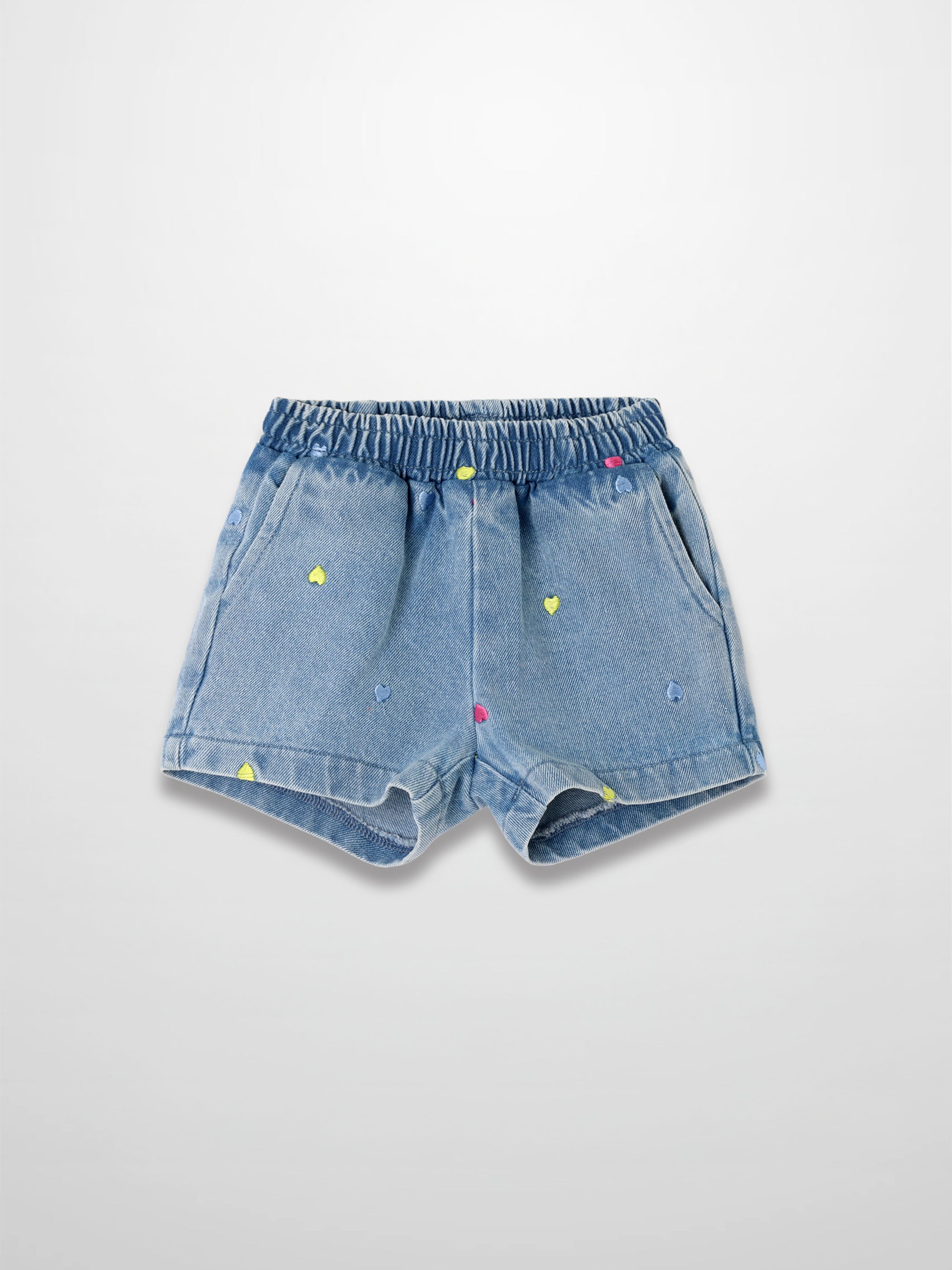 Embroidered Heart Denim Shorts in light blue denim with multicolor heart embroidery and an elastic waistband.