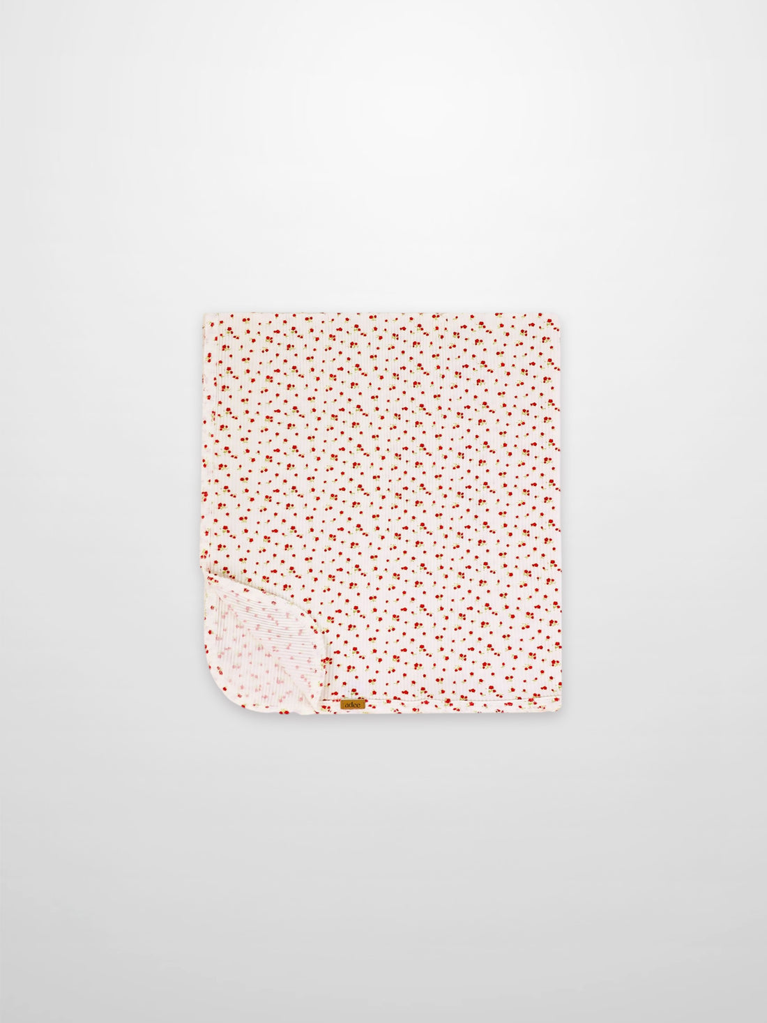 Red Flower Blanket with Lace by Adee; girls swaddle receiving blanket in white with tiny red floral pattern.