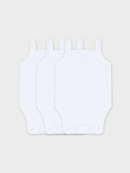 Set of three white baby bodysuits