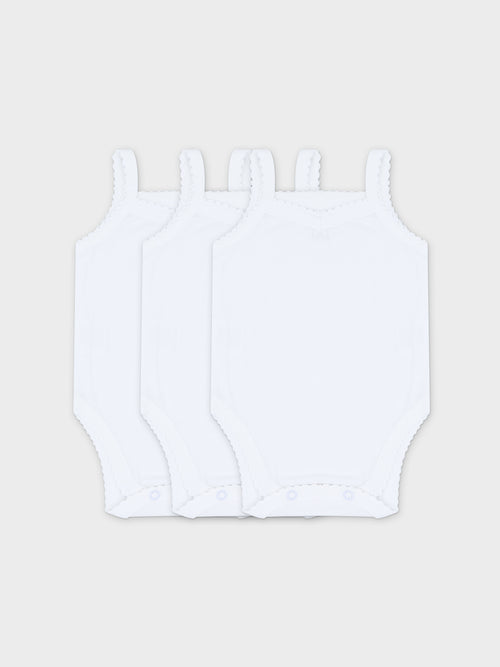 Set of three white baby bodysuits