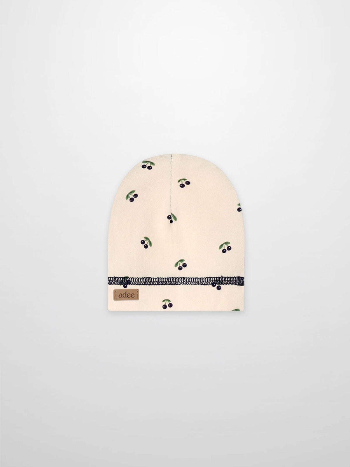 Blue cherry hat for boys by Adee, beige fabric with green leaves
