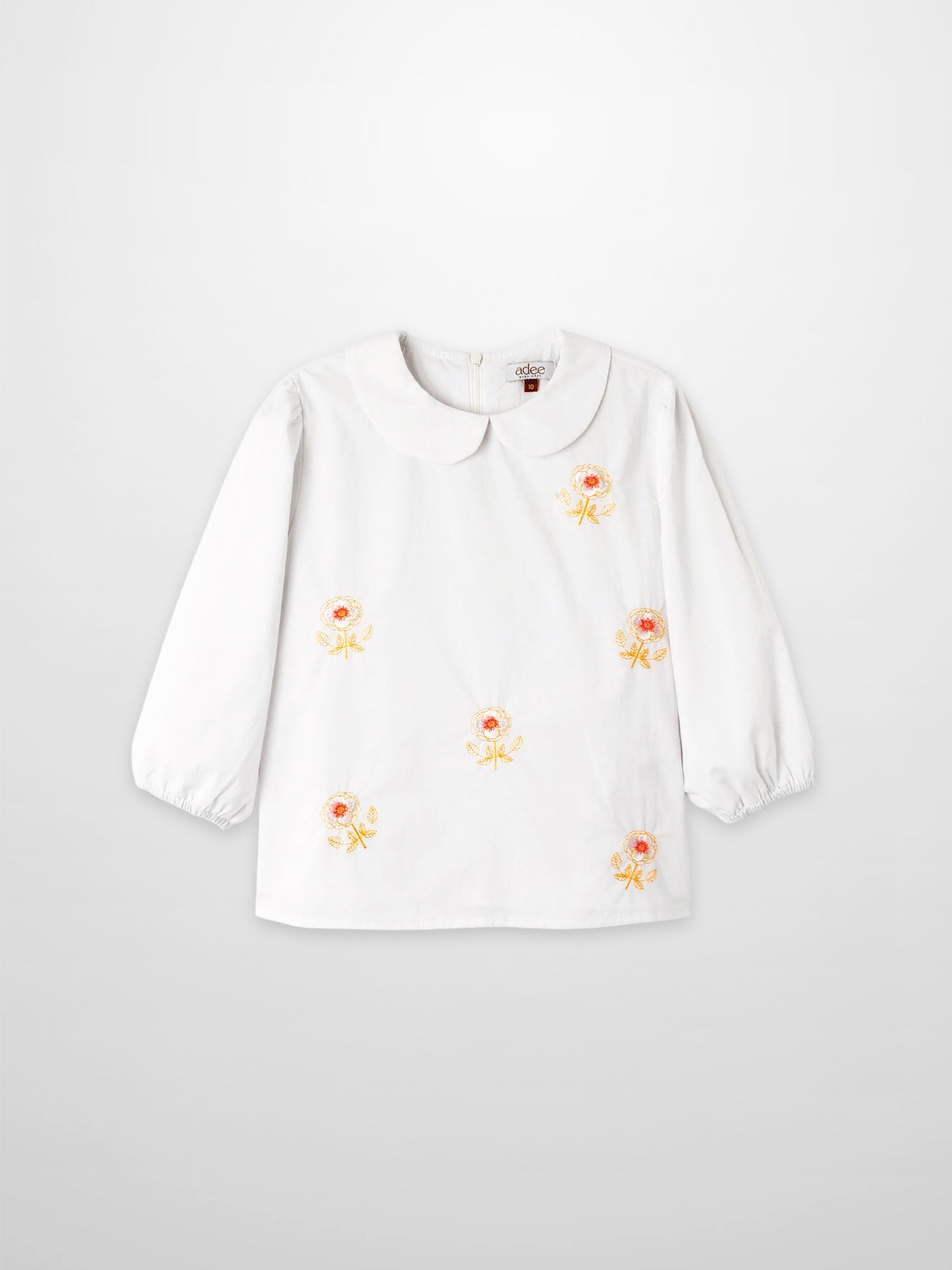 Embroidered Flower Shirt by Adee, white girls dressy top with orange-yellow floral embroidery and a Peter Pan collar.