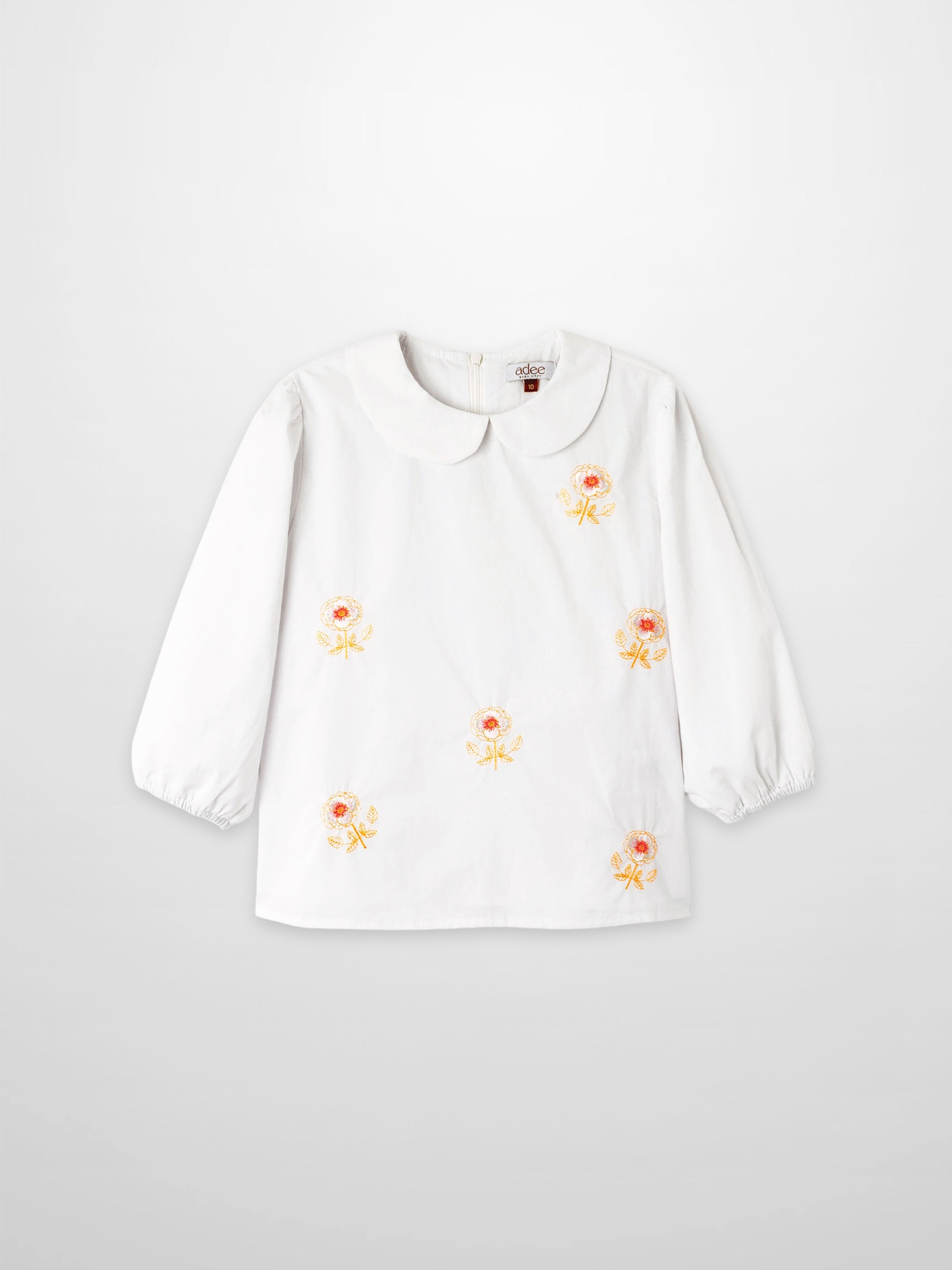 Embroidered Flower Shirt by Adee, white girls dressy top with orange-yellow floral embroidery and a Peter Pan collar.