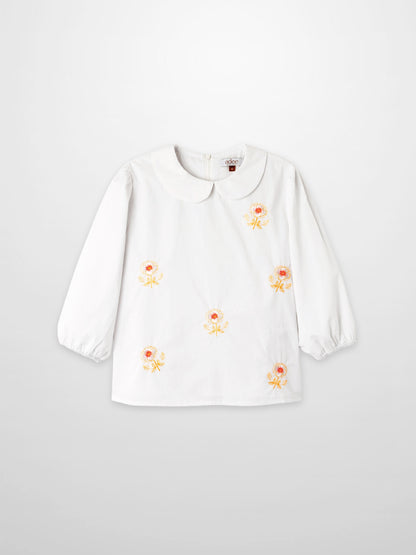 Embroidered Flower Shirt by Adee, white girls dressy top with orange-yellow floral embroidery and a Peter Pan collar.