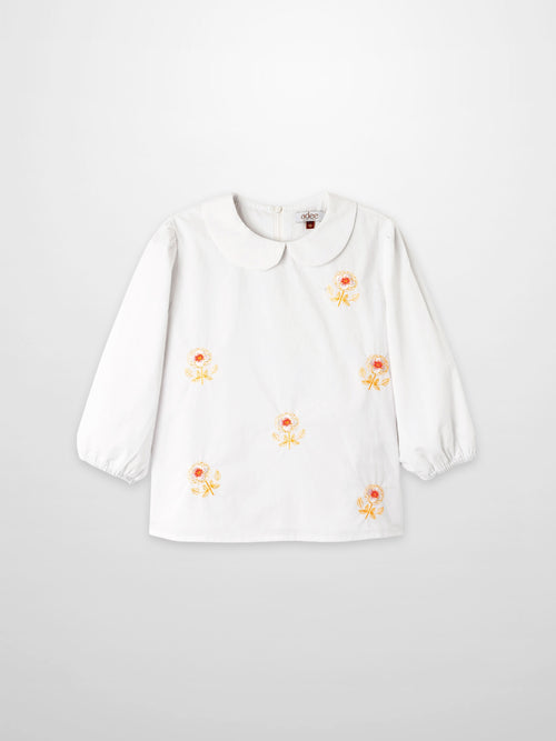 Embroidered Flower Shirt by Adee, white girls dressy top with orange-yellow floral embroidery and a Peter Pan collar.