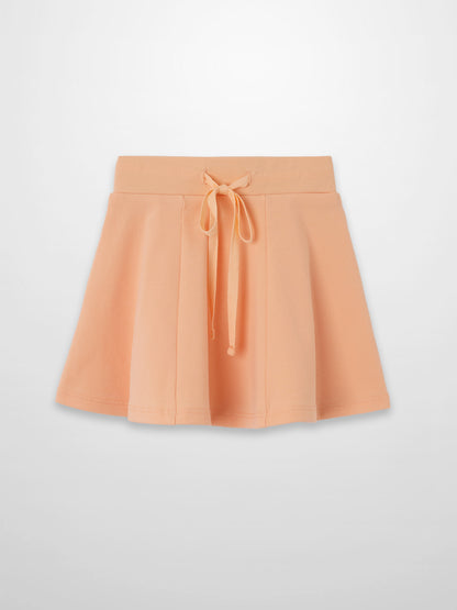 Peach 6-panel skirt with a front tie drawstring waist.