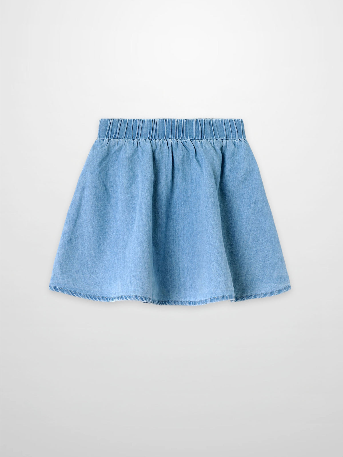Circle skirt for girls in light denim with an elastic waistband.