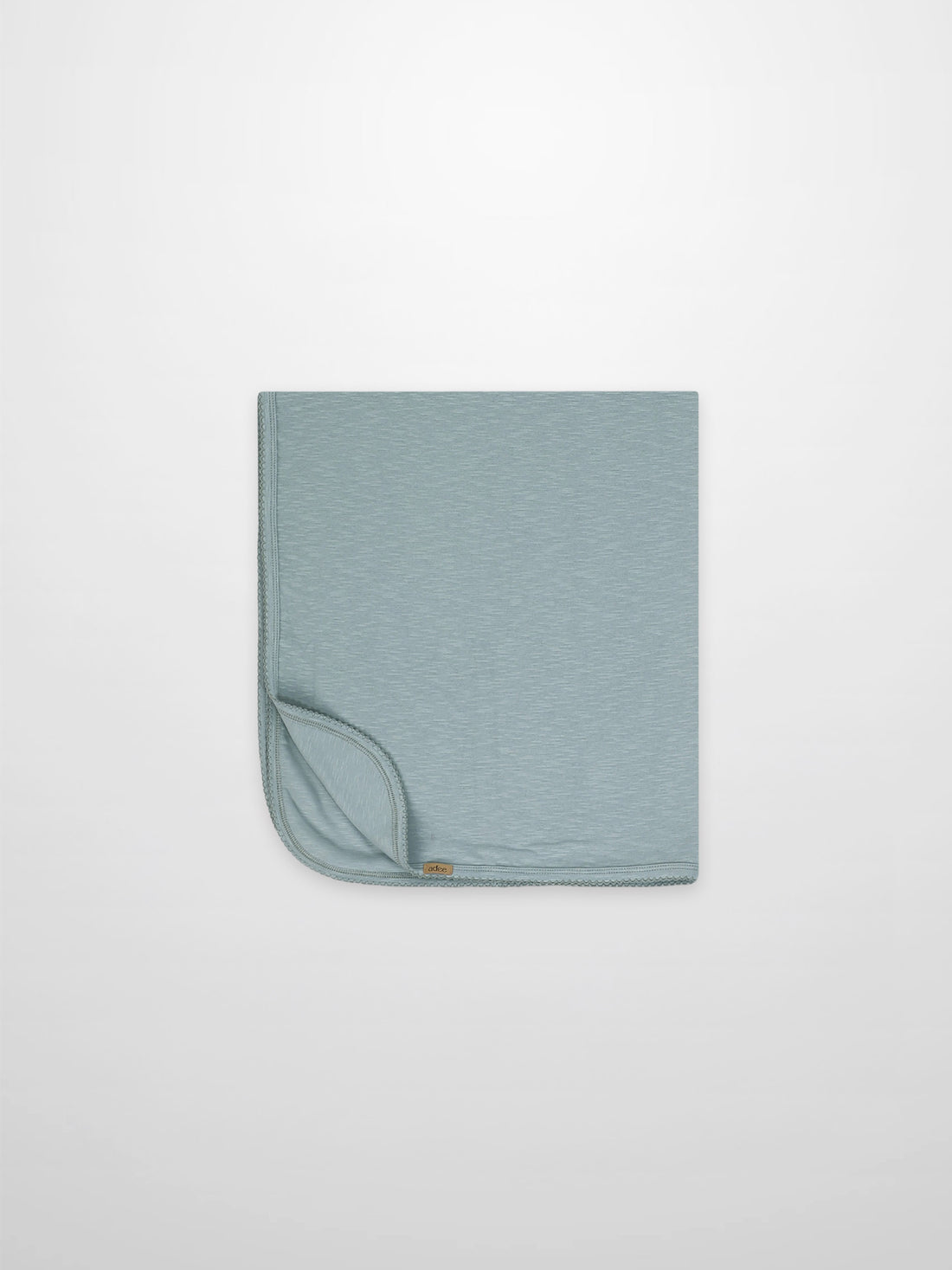 Blue scalloped swaddle blanket by Adee; light blue boys&