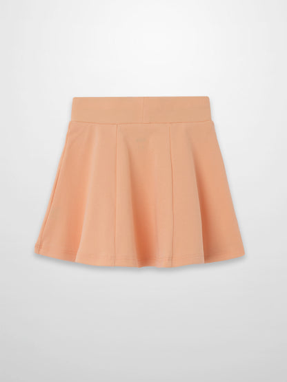 Peach 6-panel A-line skirt with a wide waistband and soft pleats.