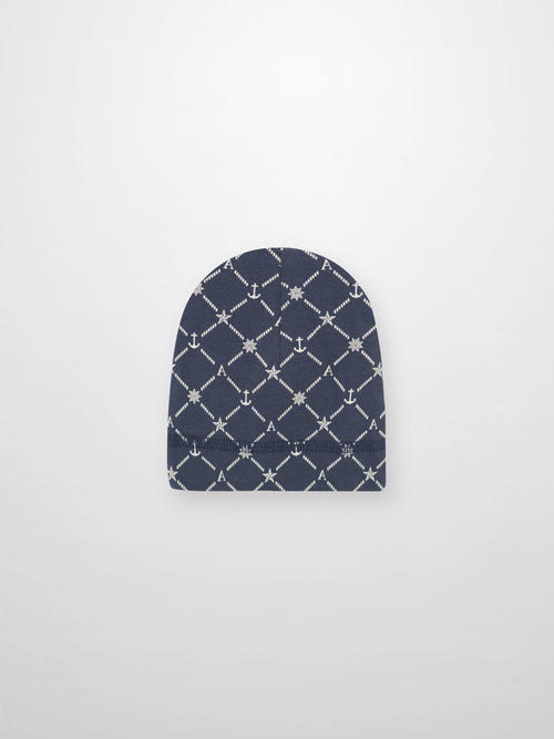 Crossover Anchor Beanie - Navy with white rope-diamond pattern featuring anchors, stars, ship wheels, and A accents.
