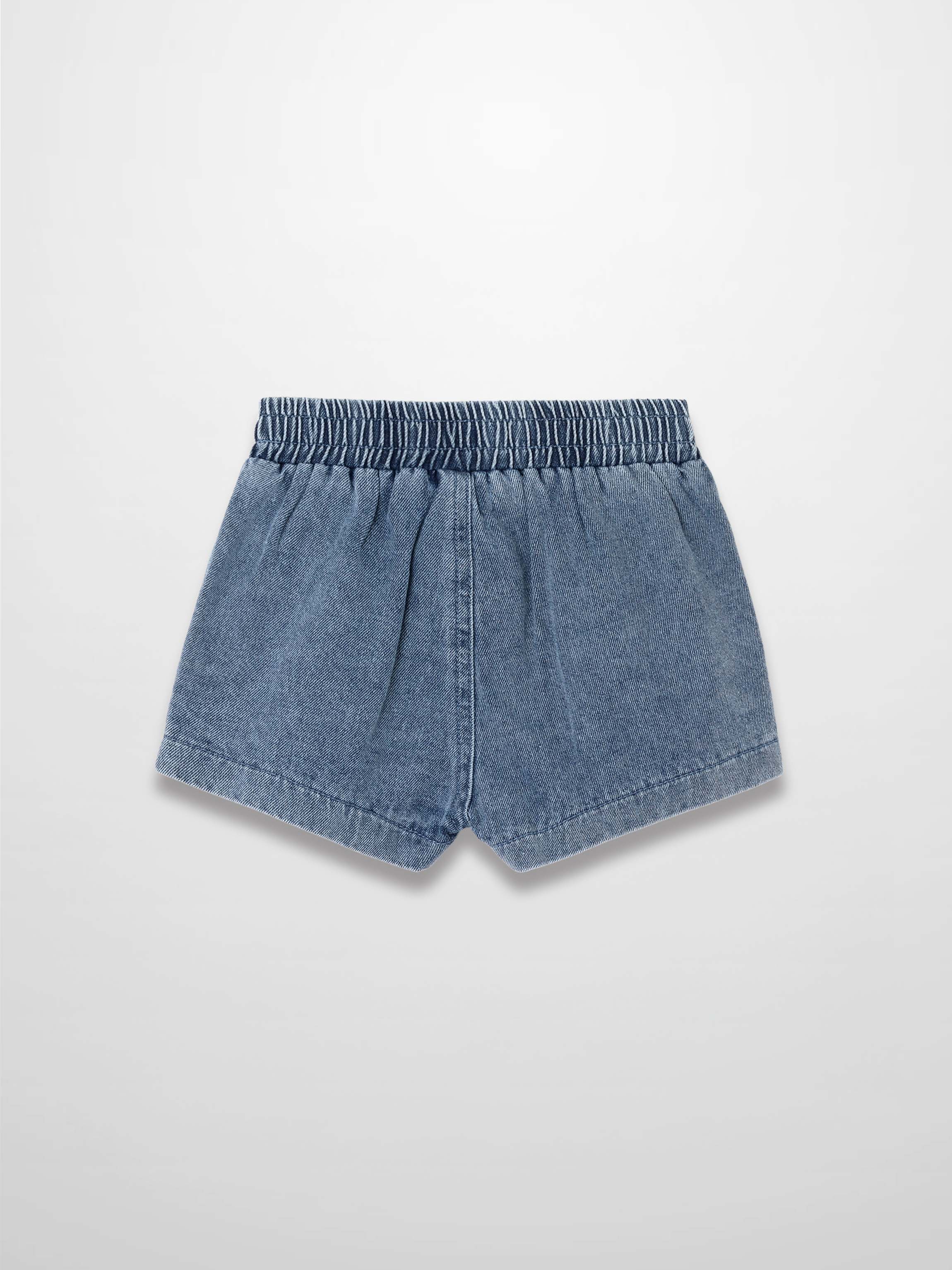 Paneled blue denim shorts with elastic waistband and curved hems.