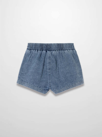 Paneled blue denim shorts with elastic waistband and curved hems.