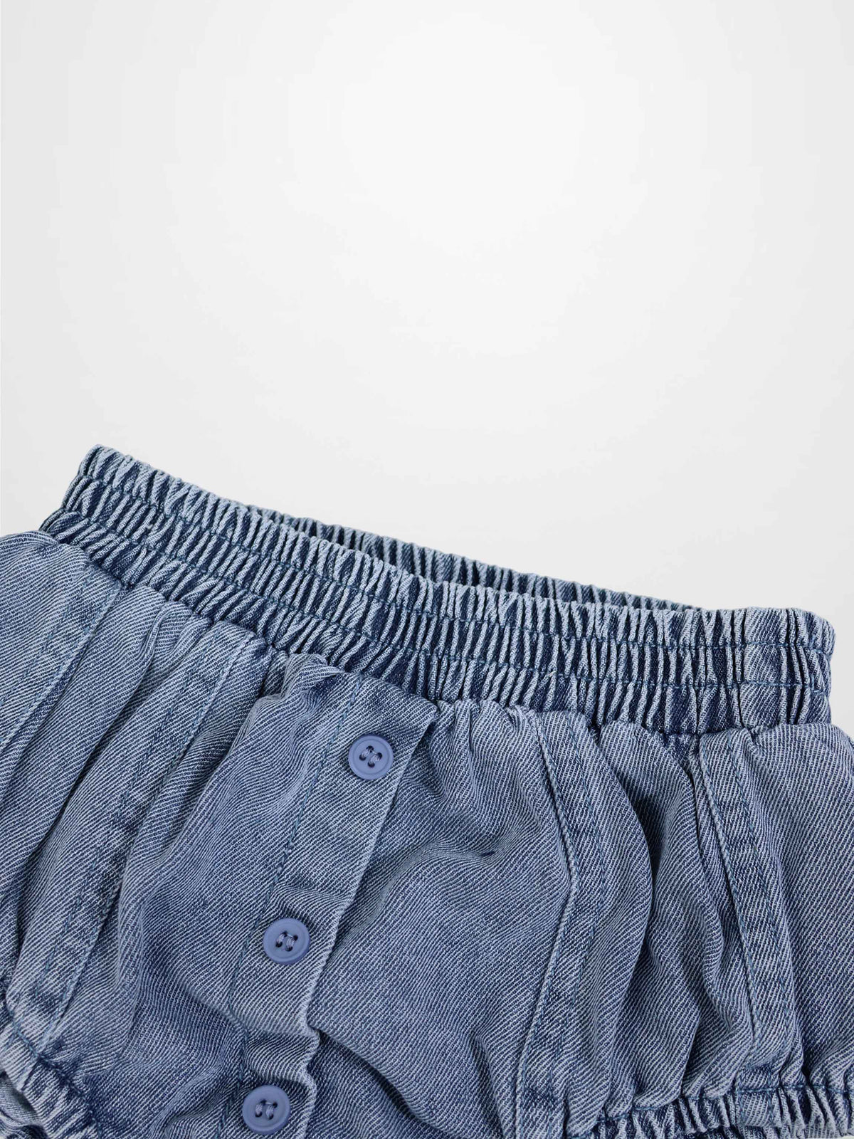Paneled Bloomers in blue denim by Adee; unisex bottoms with elastic waistband and front buttons.