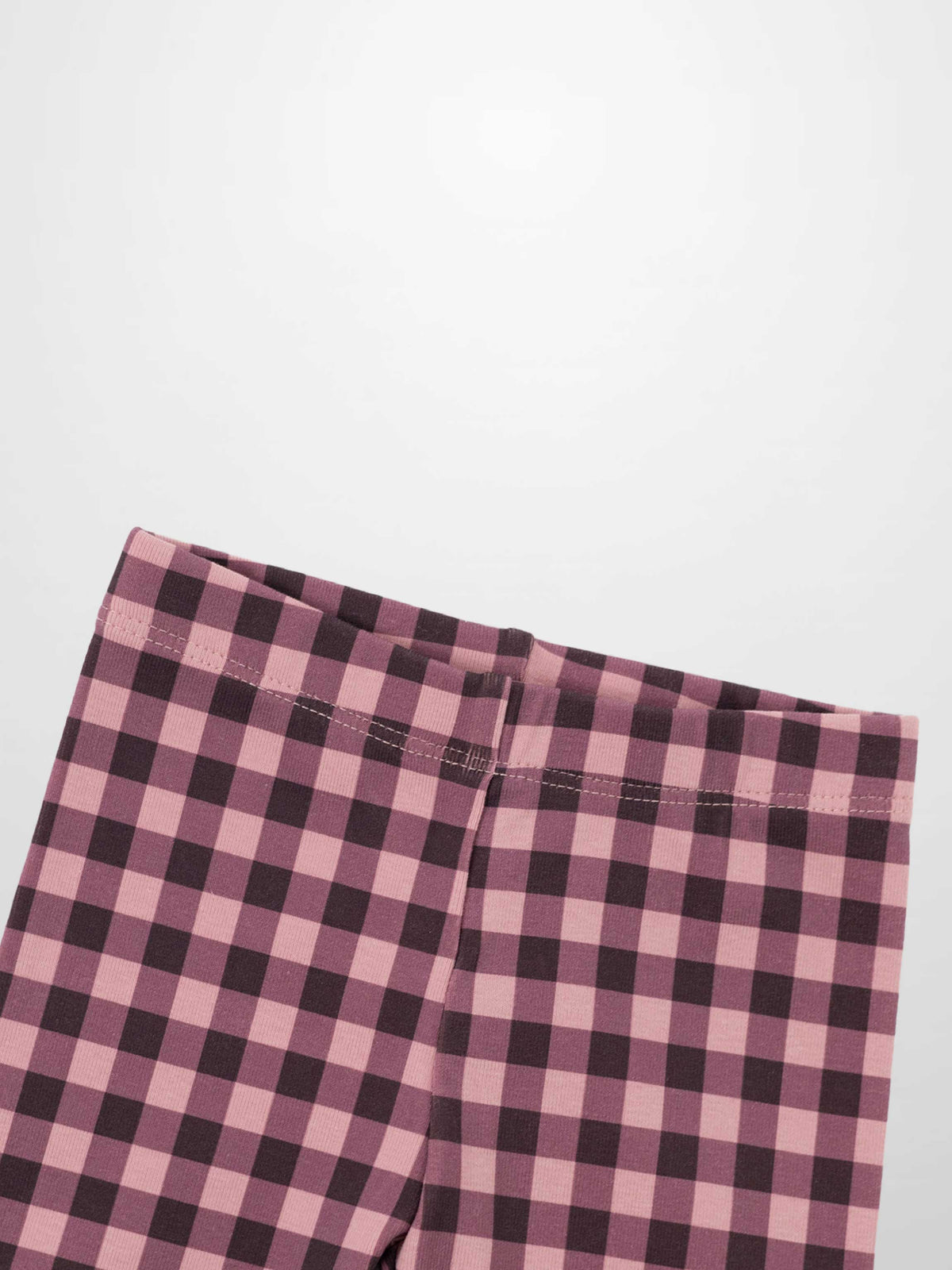 Girls burgundy and pink gingham pajama pants with a flat waistband.