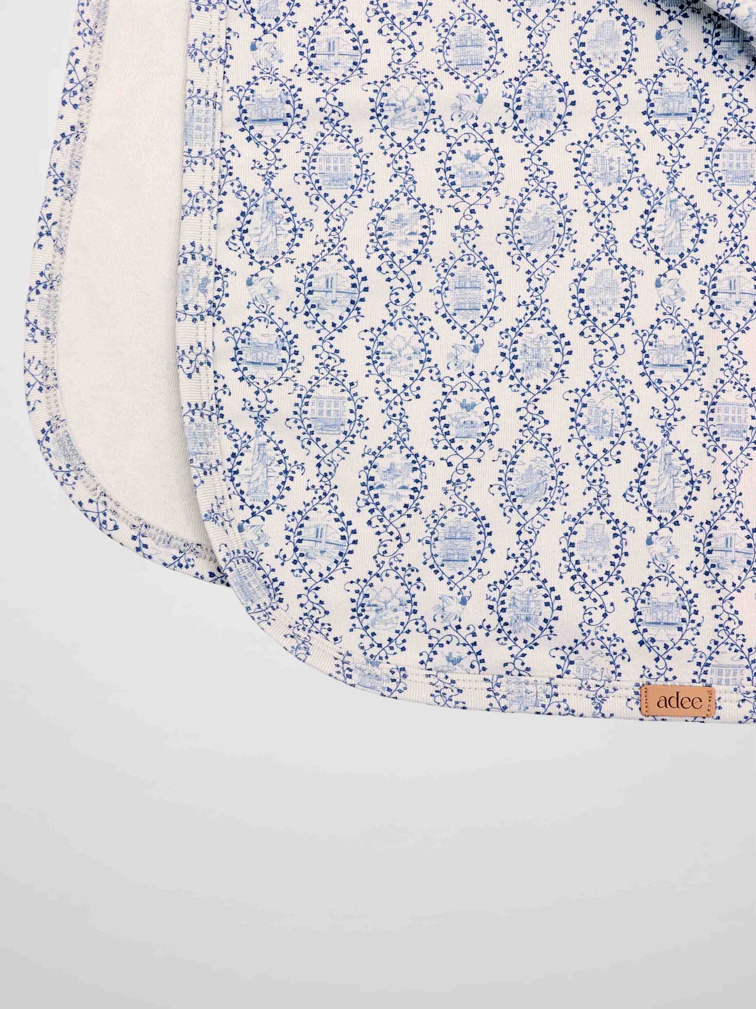 Blue Charm Blanket swaddle blanket for boys with a dark blue vine pattern by Adee