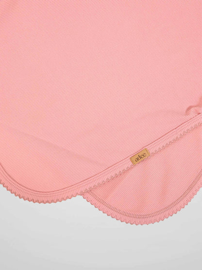 Thin ribbed pink swaddle blanket for girls by Adee with scalloped edge trim