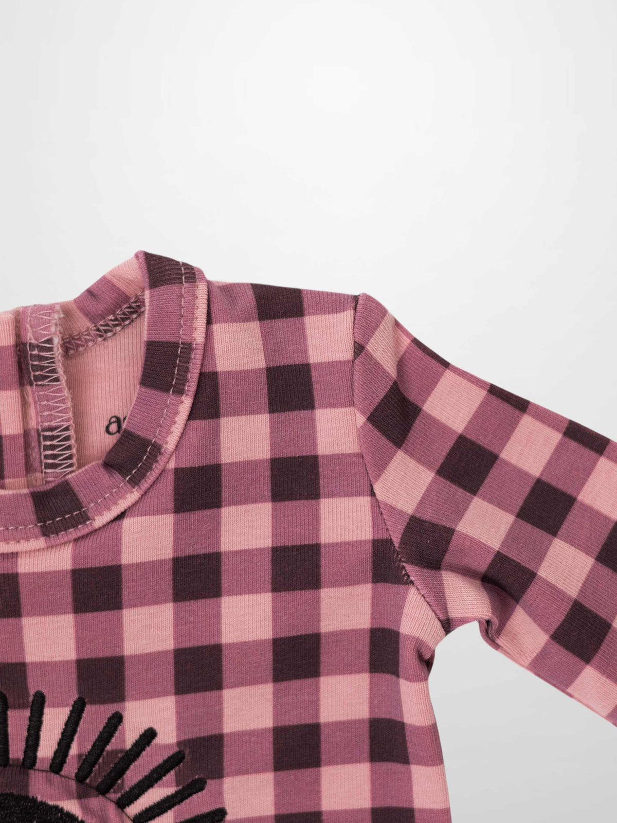 Pink and red gingham baby footie with sun embroidery and ADEE on the front, stretchy fabric