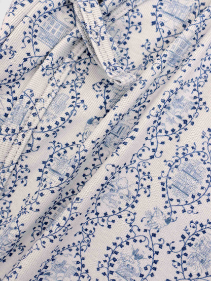 Blue Charm Blanket for boys swaddle featuring a dark blue vine pattern on white fabric