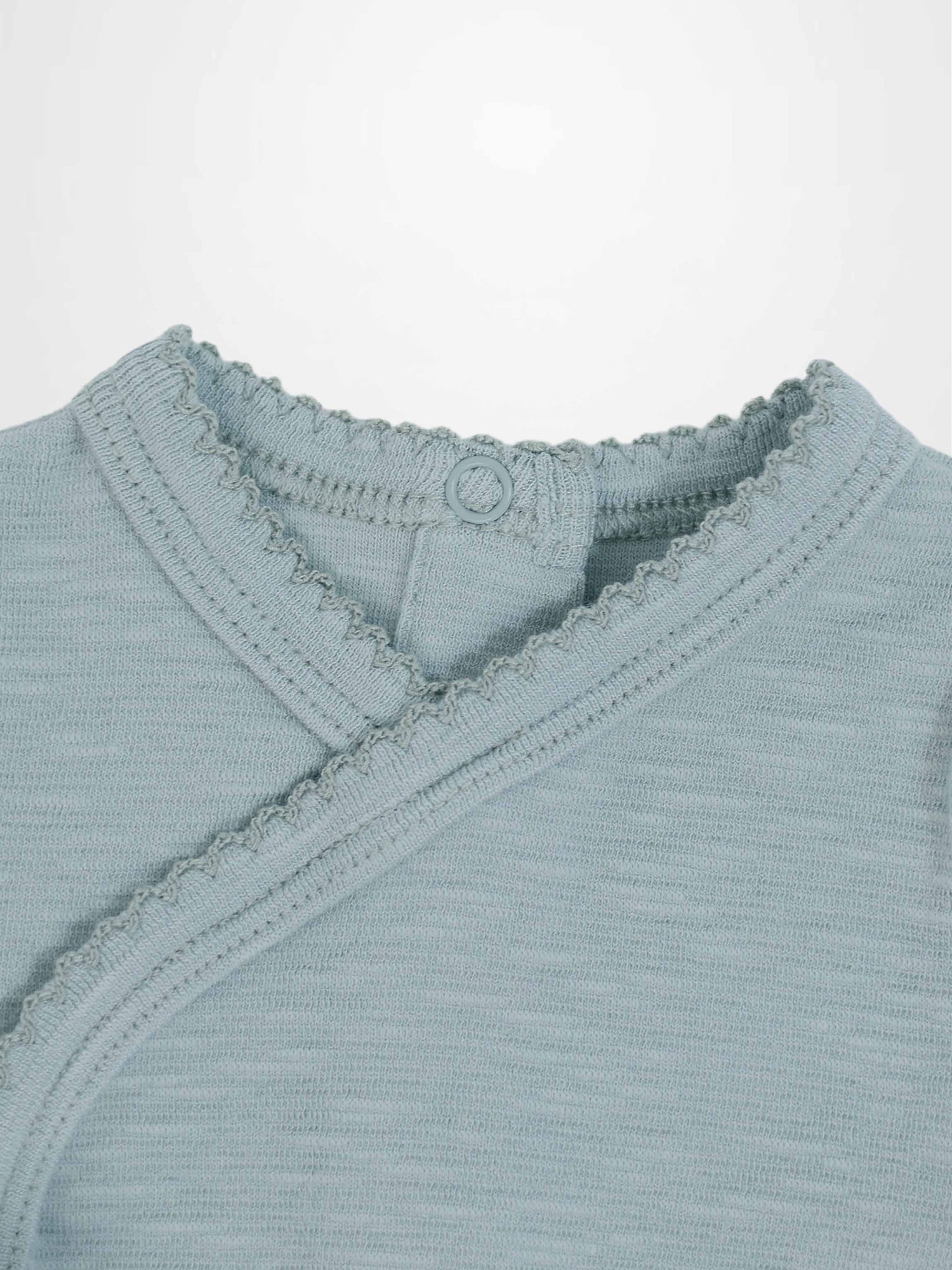 Blue Scalloped Stretchy boys top by Adee; knit fabric with scalloped trim and back-neck button.