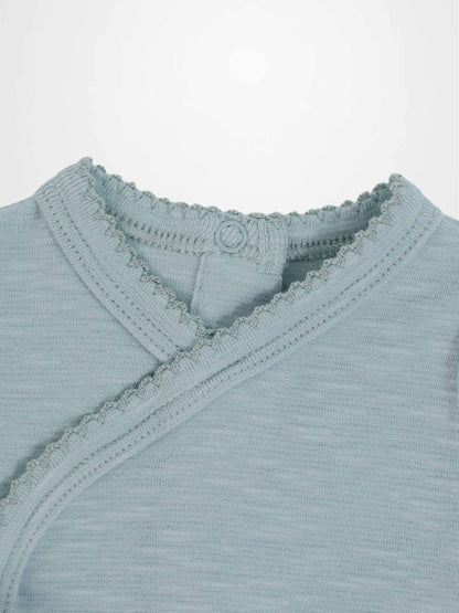 Blue Scalloped Stretchy boys top by Adee; knit fabric with scalloped trim and back-neck button.