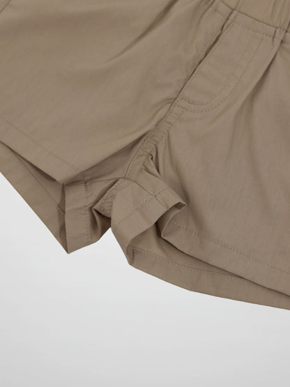 Adee tan cotton shorts for boys with rolled cuffs and an elastic waistband.