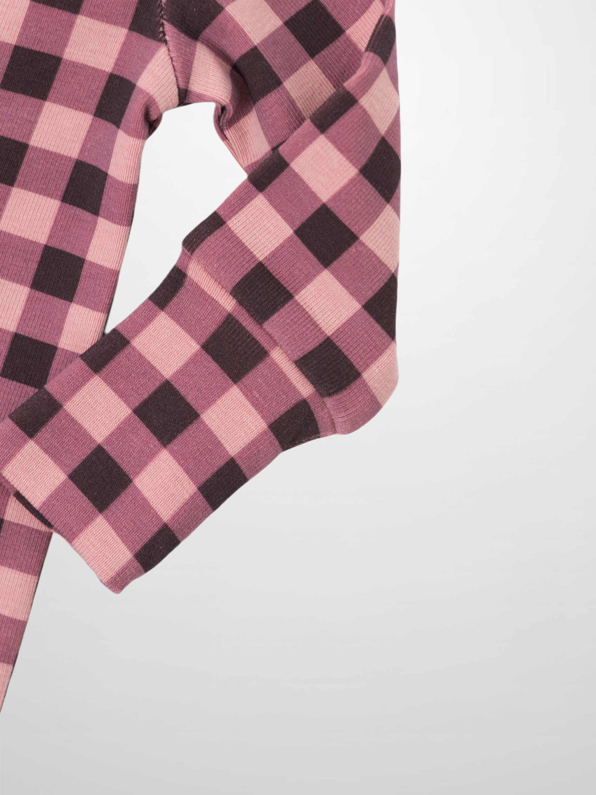 Pink and red gingham baby footie in soft stretchy fabric with inseam zipper.