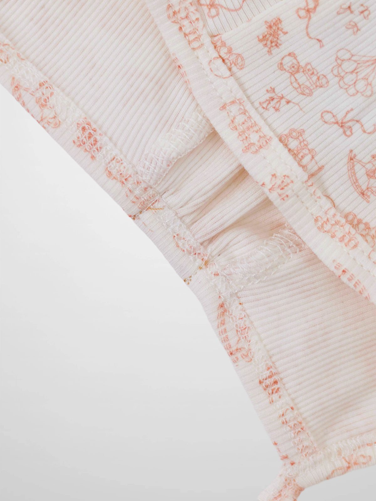 Little Storybook Bonnet - Pink, baby girls bonnet in white ribbed fabric with pink illustration print and elastic edges