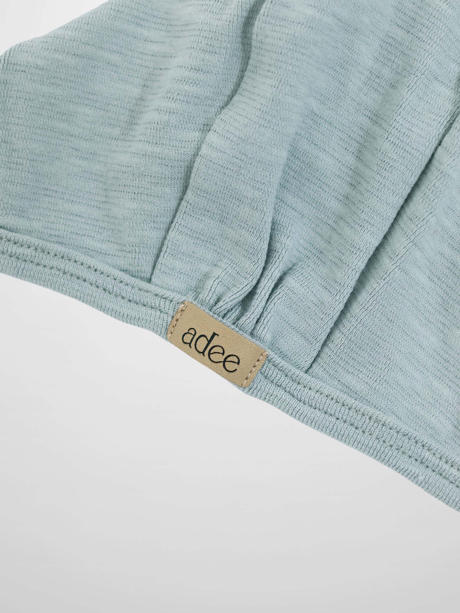 Blue Scalloped Bonnet for boys by Adee; soft light-blue fabric.