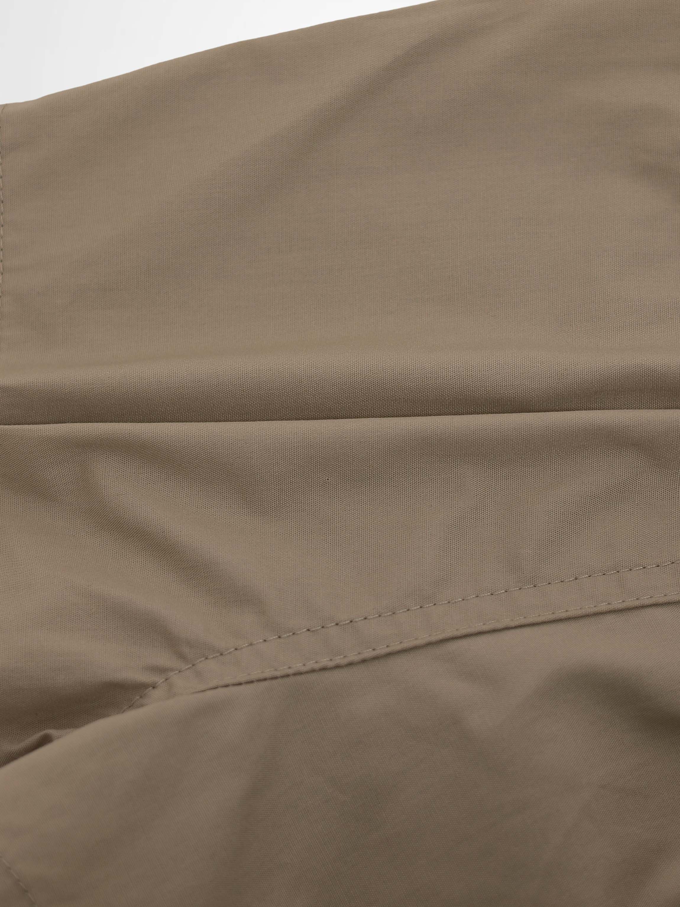 Tan cotton shorts for boys; dressy bottoms with neat stitching detail