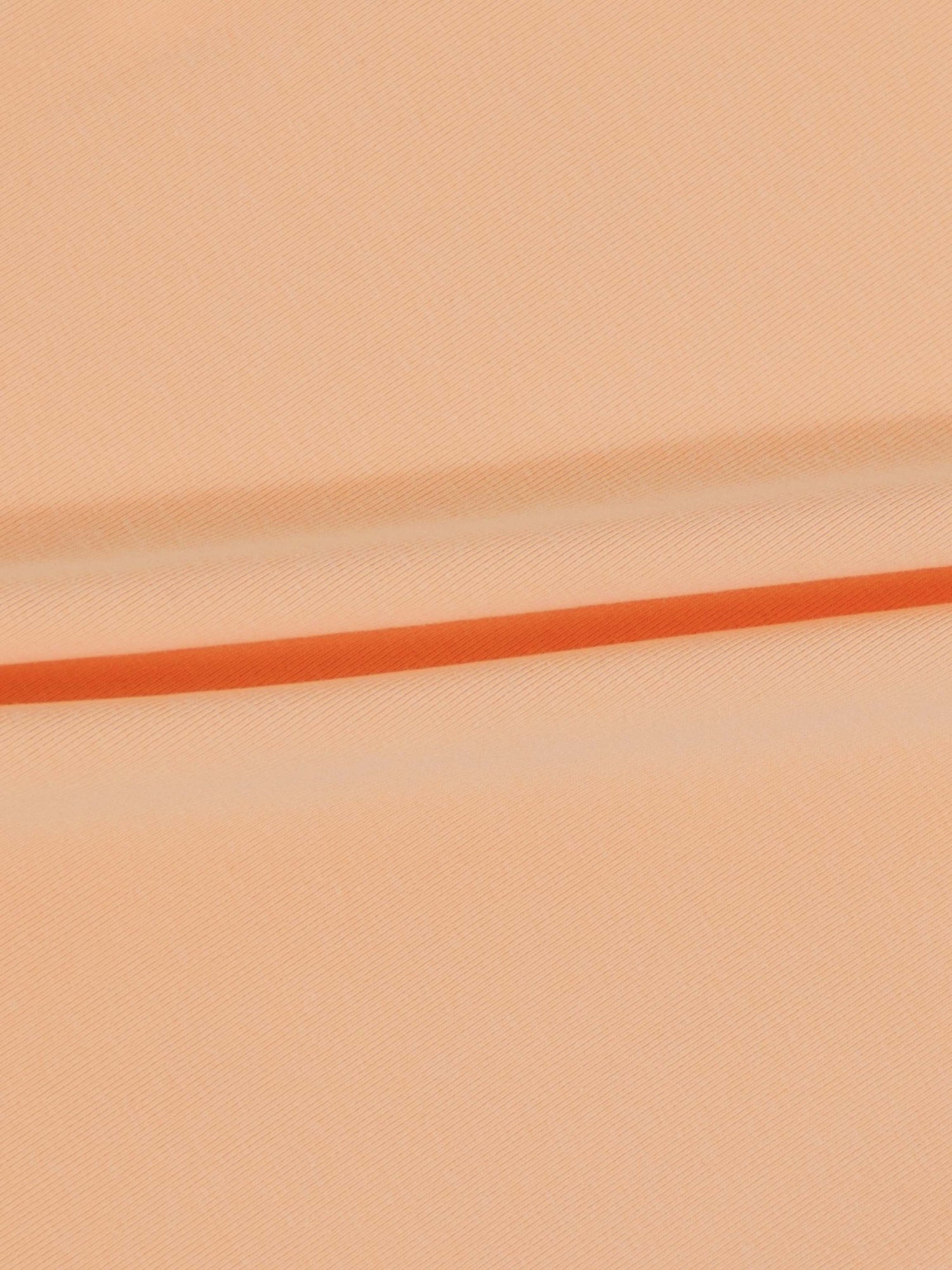 Peach 3/4 puff sleeve T-shirt fabric close-up with orange stripe.