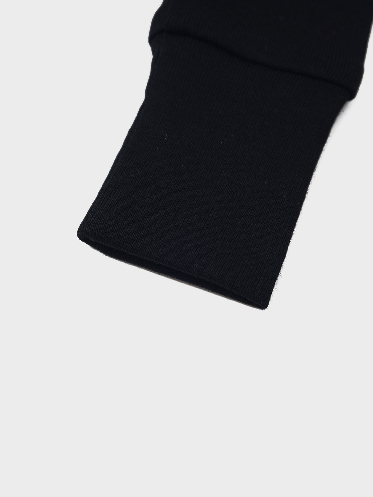 City Stretchy unisex stretchies jumpsuit footie in black knit fabric