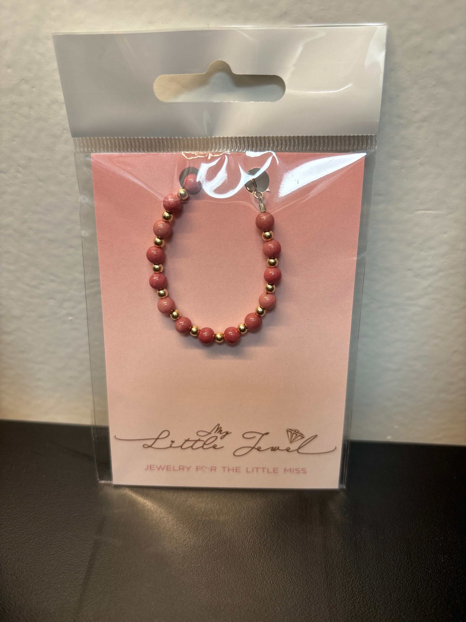 Rhodonite bead bracelet in packaging