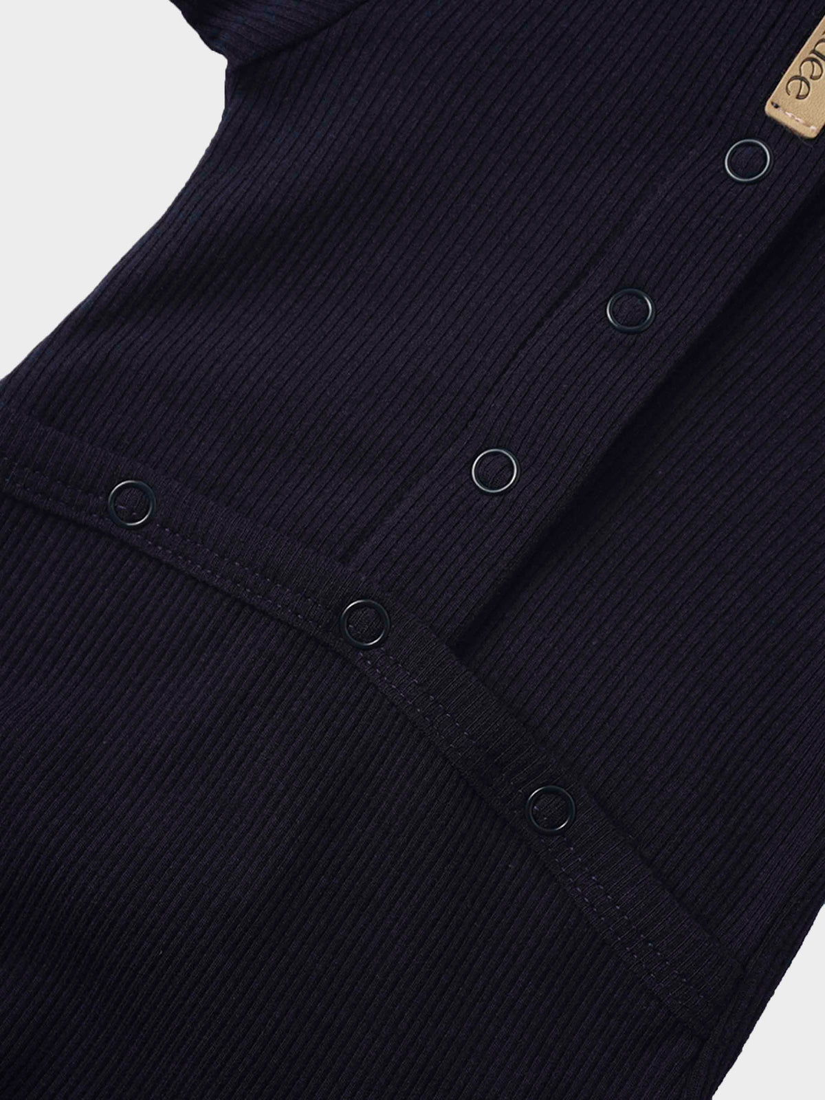 Navy ribbed baby footie with a mock neck and front snap placket.