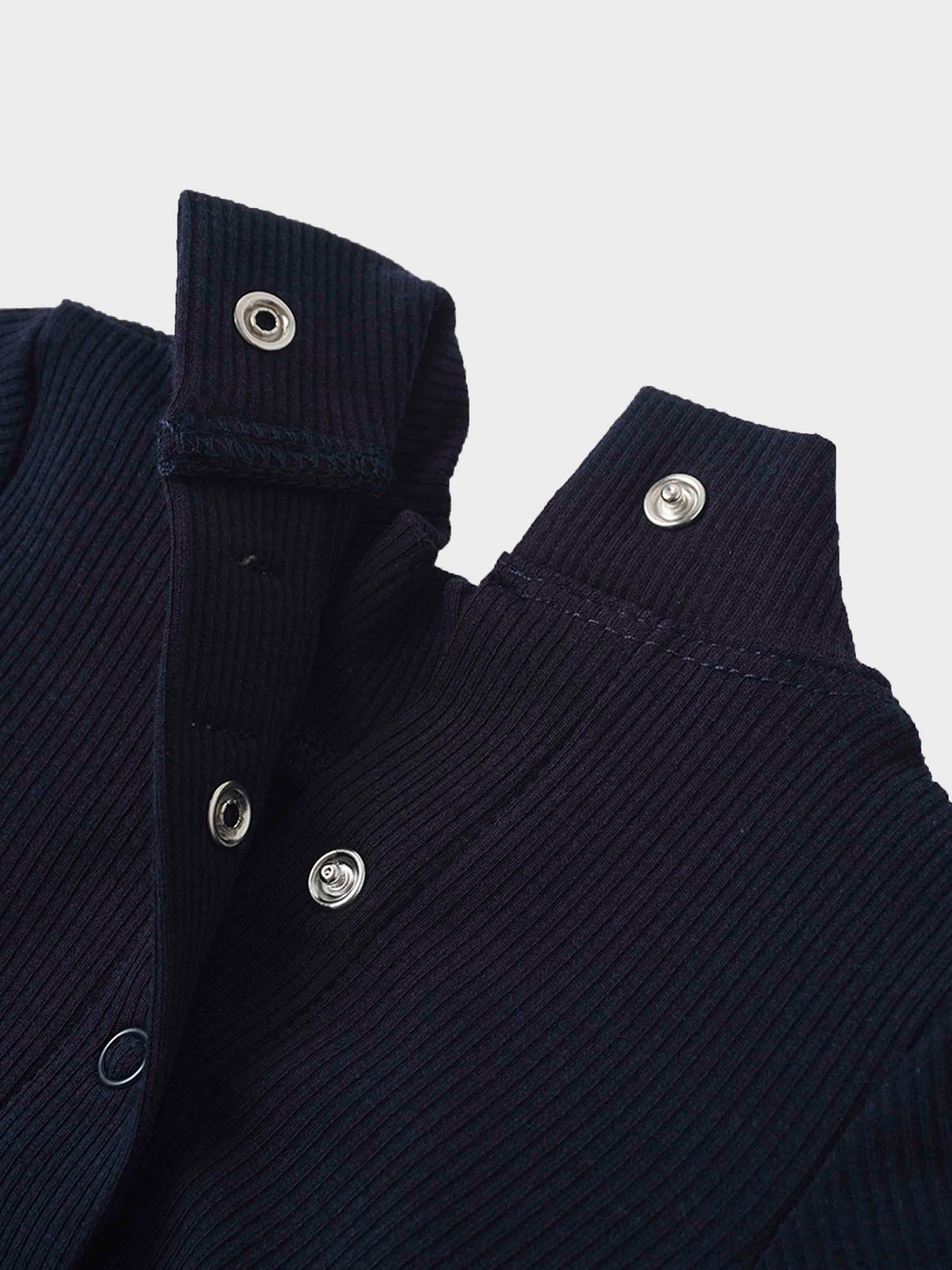 Navy ribbed footie for baby boys with mock neck and metal snap closures.