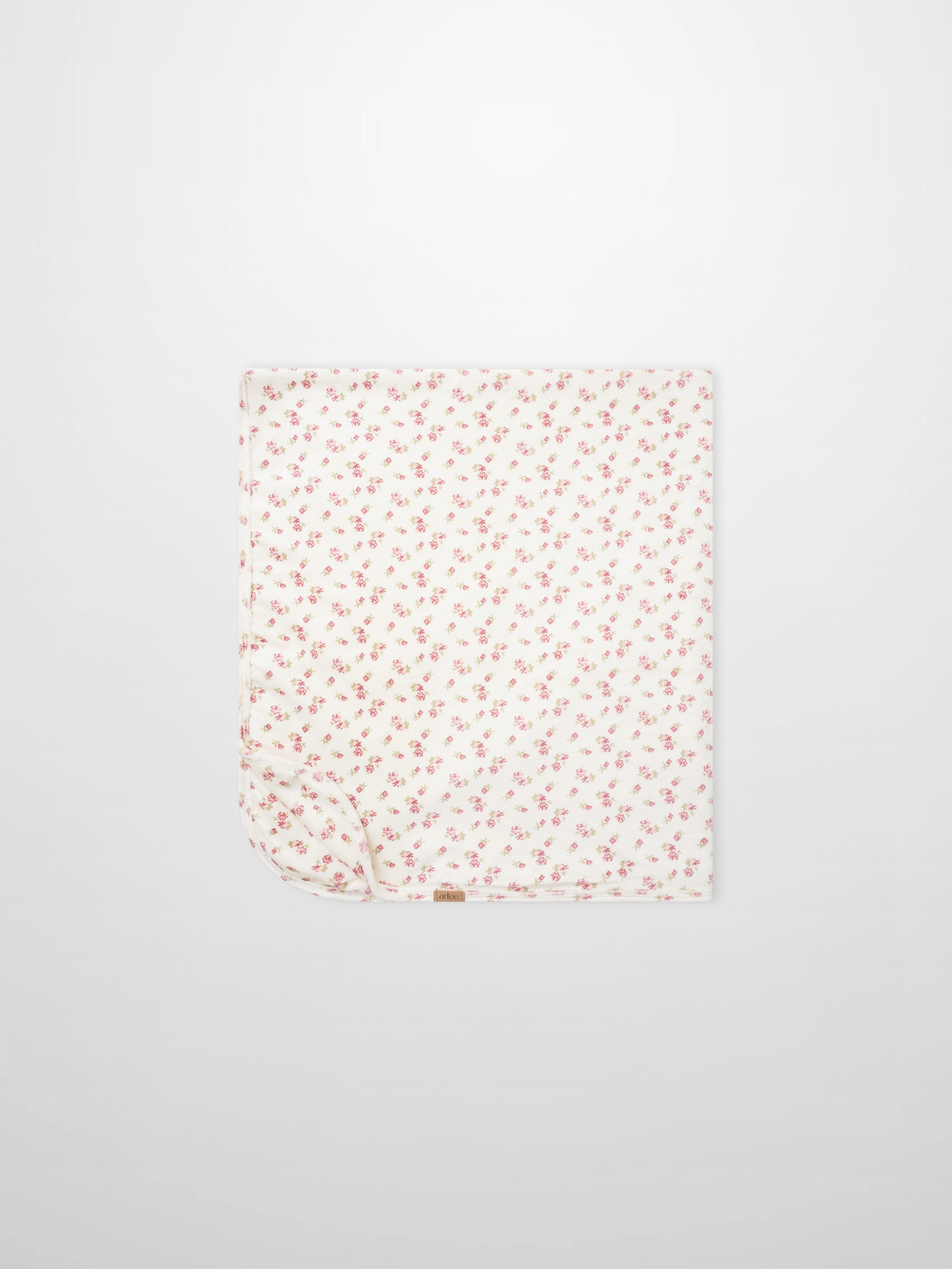Tiny Blossom Blanket by Adee; girls swaddle blanket with pink floral print on white fabric