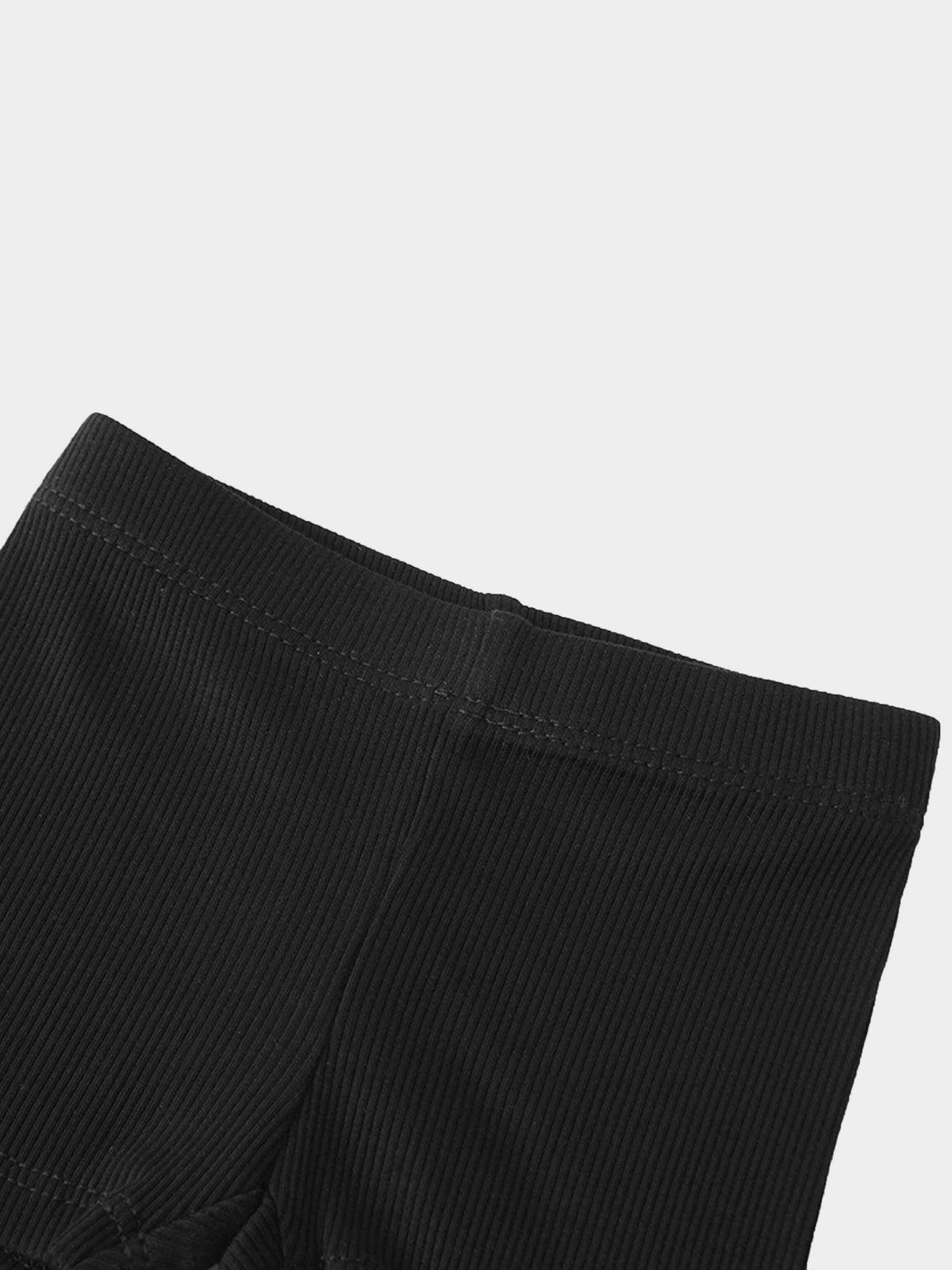 Black thin ribbed biker shorts with a snug waistband; unisex basics