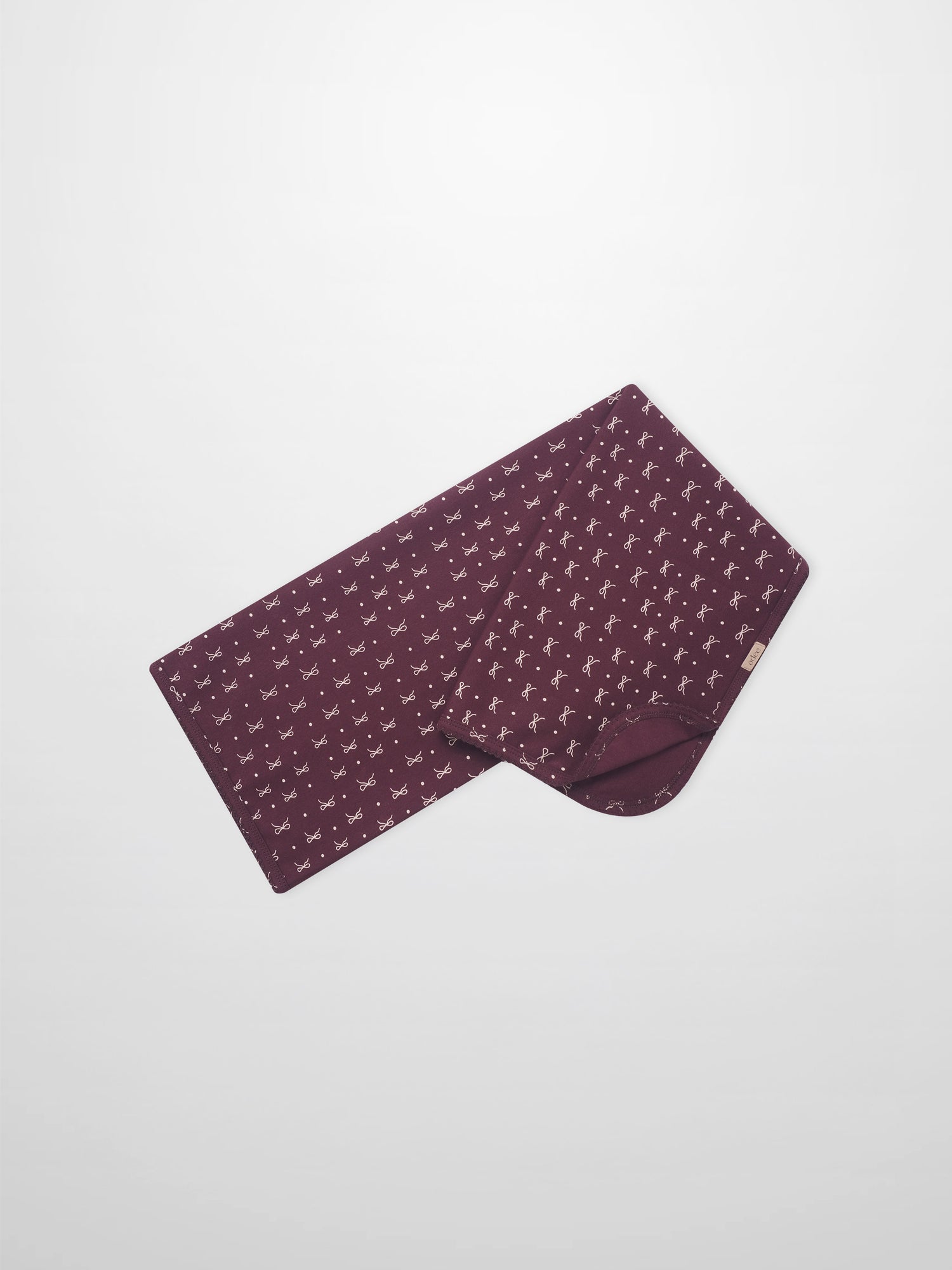 Adee Burgundy Bow Blanket swaddle for girls, burgundy with white bow pattern