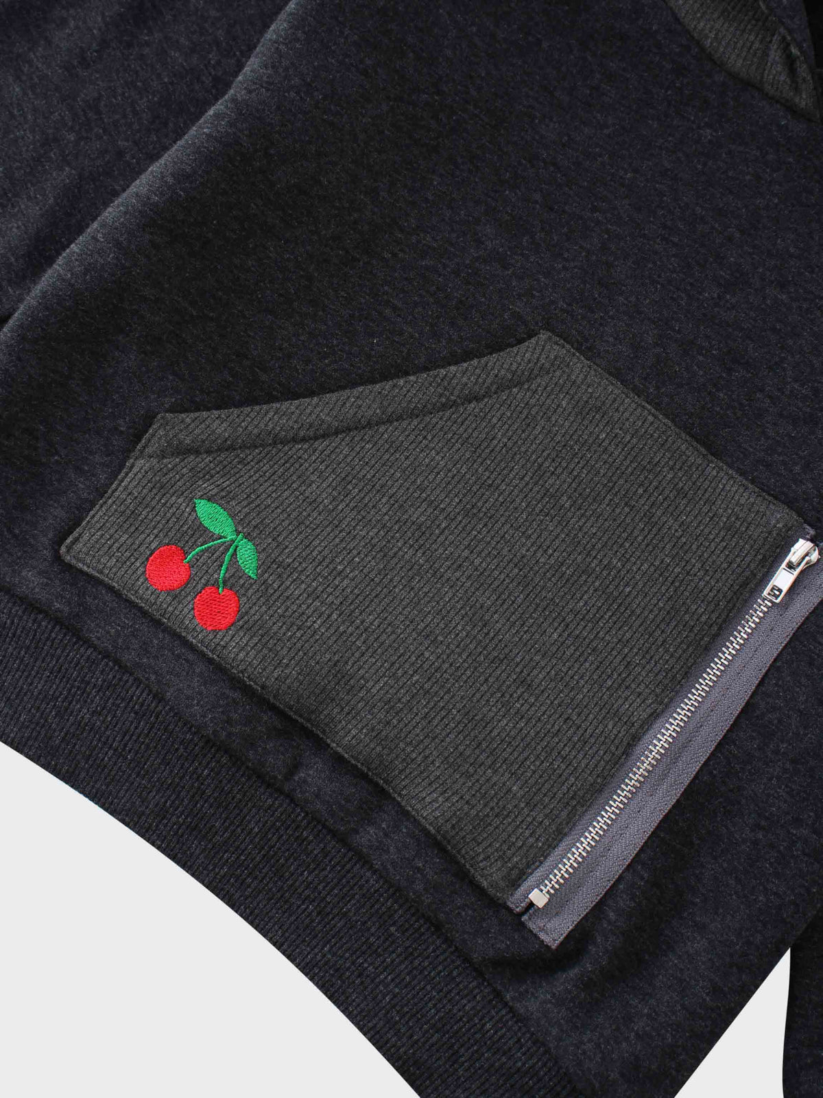 Hoodie detail with cherry accent