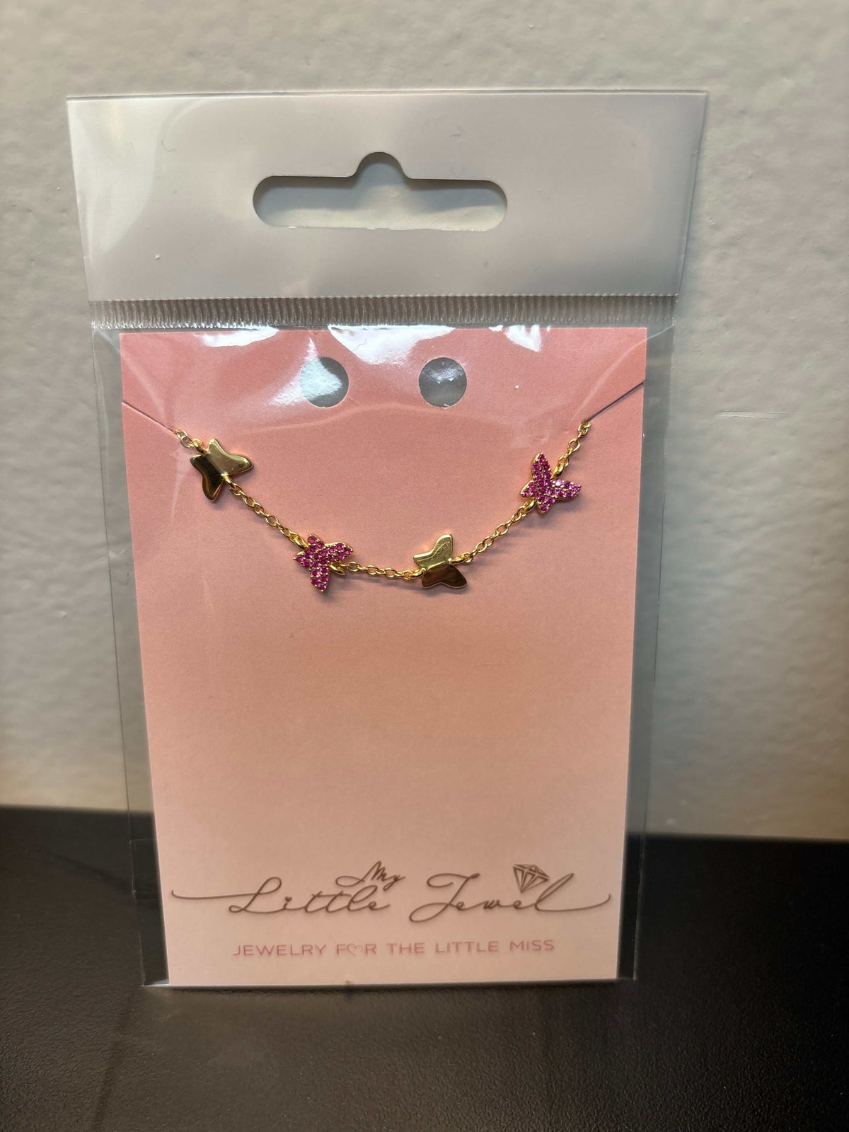 Fuchsia butterfly charm bracelet packaging