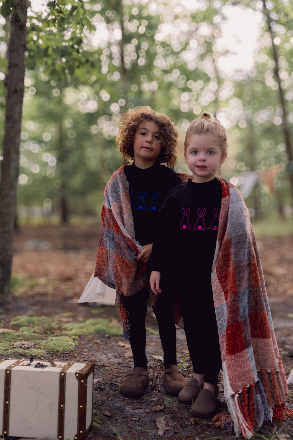 Embroidered Bunny Sweatshirt - Pink; Adee girls top, two kids wearing black sweatshirts with bunny embroidery outdoors