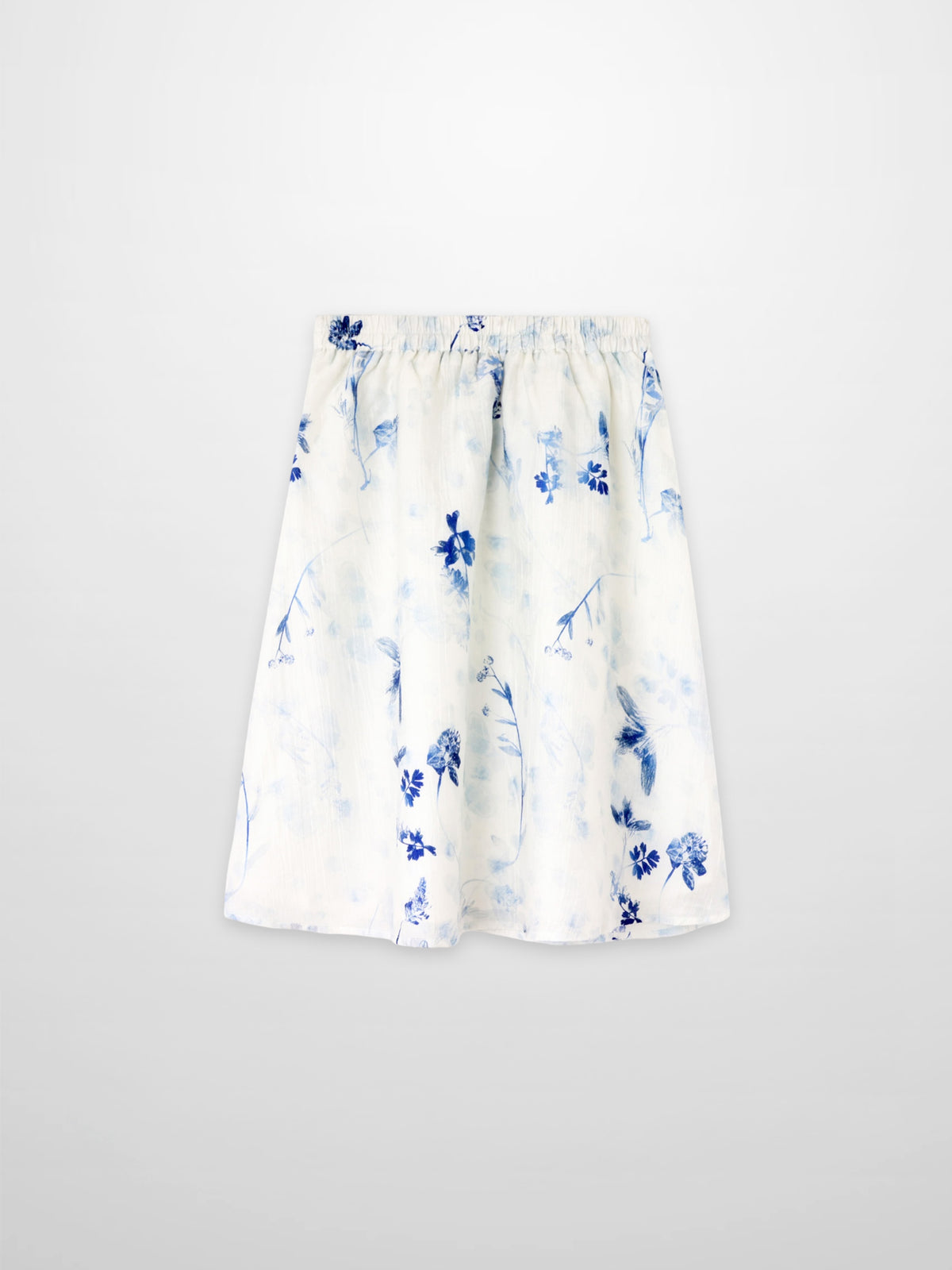 Blue Flower Skirt for girls by Adee, dressy white fabric with blue floral print and elastic waistband.
