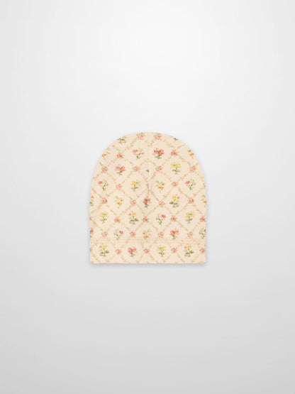 Flower Garden hat for baby girls; off-white fabric with pink/yellow floral lattice pattern