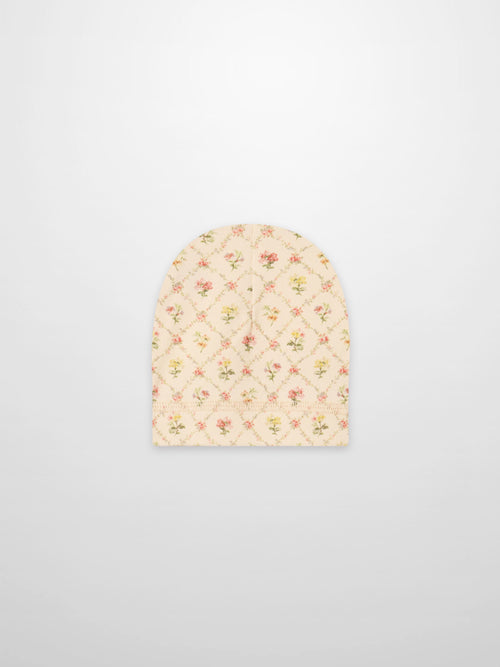 Flower Garden hat for baby girls; off-white fabric with pink/yellow floral lattice pattern