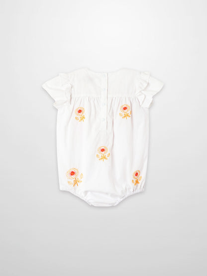 Embroidered Flower Romper for girls, white fabric with orange floral embroidery, flutter sleeves and back placket.