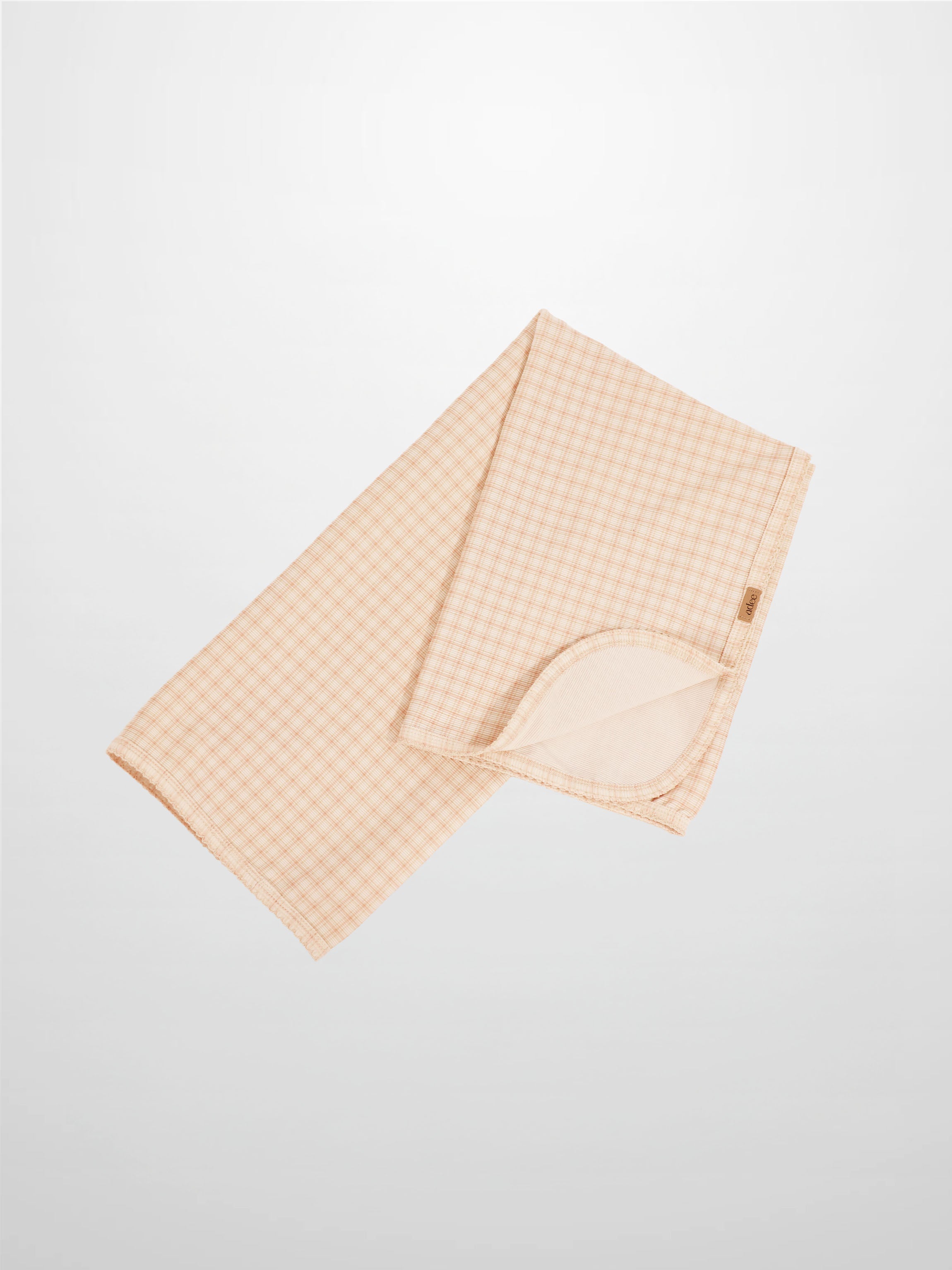 Oatmeal Grid Blanket - Pink by Adee; baby receiving swaddle blanket with light grid lines