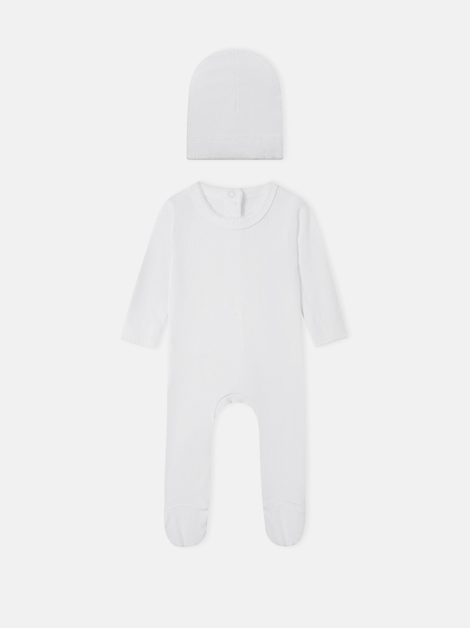 Legacy Stitch White layette set by Adee; 2-piece unisex white ribbed knit hat and footed romper.
